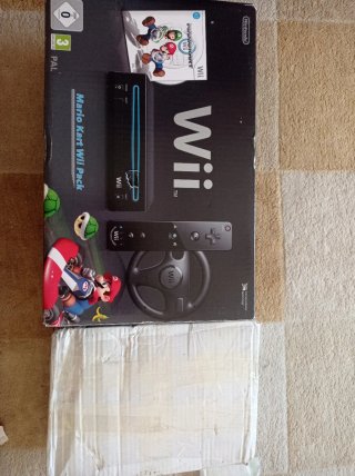 Nintendo Wii Consola, 9 Accesorios con 2 juegos