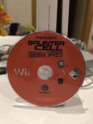 Consola Wii + 2 Mandos + Volante + 10 Juegos