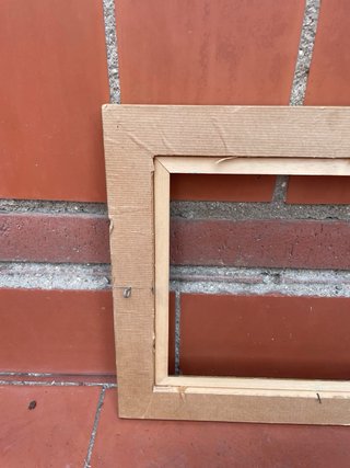 Marco de madera vintage dorado