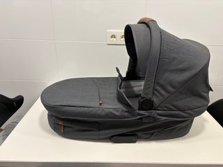 Capazo Mutsi Nio con protector de lluvia