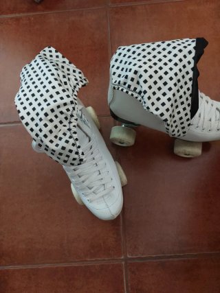 Patines 4 ruedas Boomerang Talla 37 y complementos