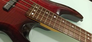 Bajo Schecter C-4 Deluxe Crimson Red Burst