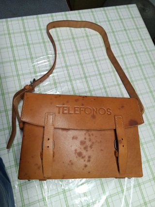 Cartera antigua de cuero Teléfonos
