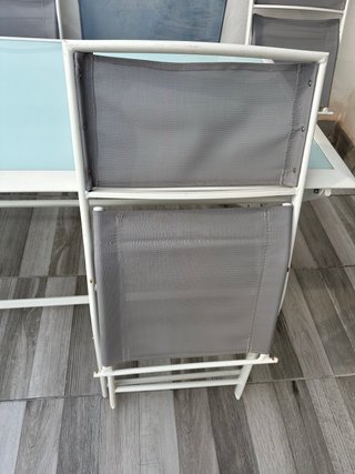 Mesa plegable cristal y 4 sillas