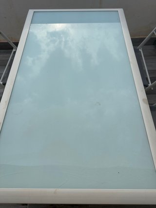 Mesa plegable cristal y 4 sillas