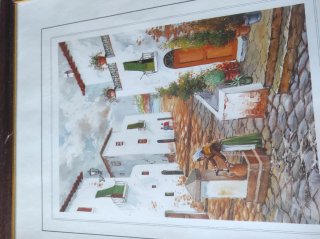 Cuadro decorativo fuente de pueblo con casas