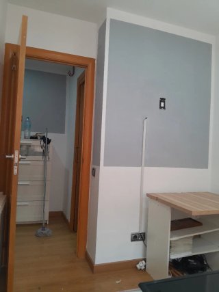 Albañil, paleta. Oficial de primera.