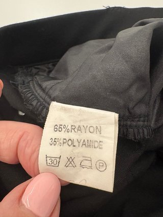 Pantalón negro acampanado elástico