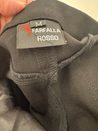 Pantalón negro acampanado elástico