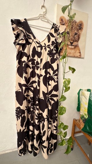 Mono estampado floral beige y negro