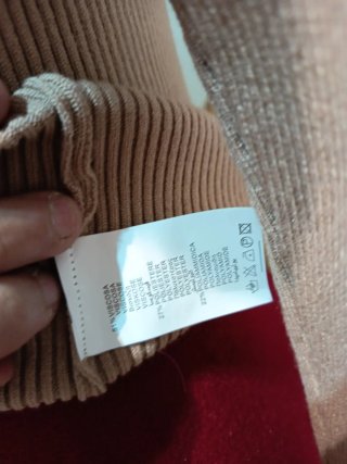 Jersey beige con cuello de pelo
