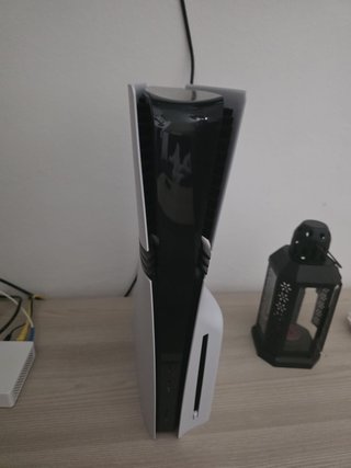 PS5 con 3 juegos y 2 mandos