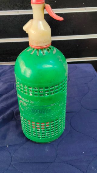 Sifón de plástico verde