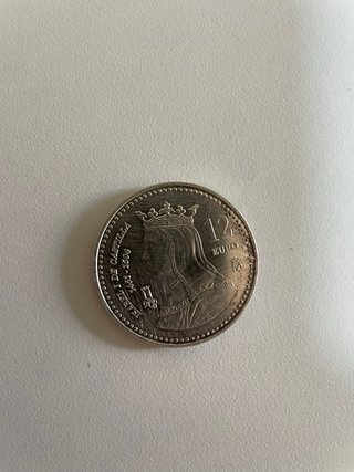 Monedas de colección con retratos