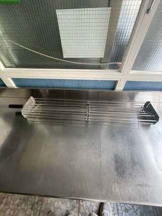 Espada para asar muslos de pollo