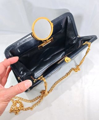 Pochette vintage anni 80 nera con catena oro