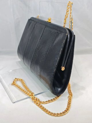 Pochette vintage anni 80 nera con catena oro