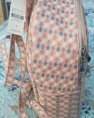 Mochila Parfois juvenil con etiqueta