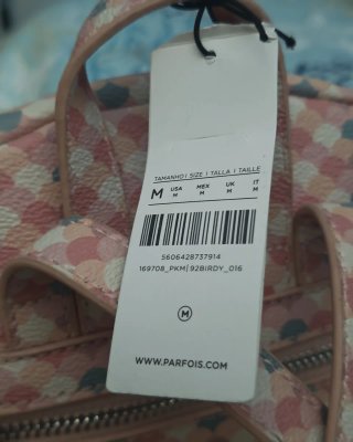 Mochila Parfois juvenil con etiqueta