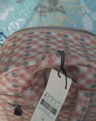 Mochila Parfois juvenil con etiqueta