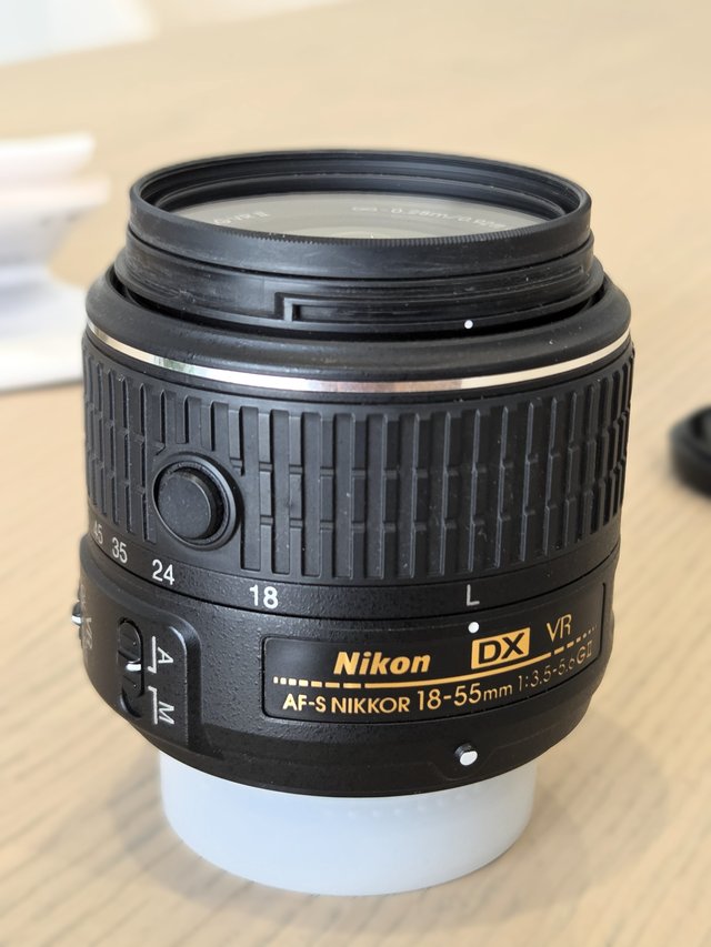 Lente Nikon AF-S DX 18-55mm VR II + filtro UV