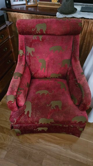 Butaca clásica con estampado de felinos