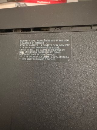 PS3 Slim 320GB + Mando + Caja + 7 Juegos