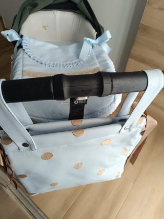 Bolso y sombrilla para cochecito a juego