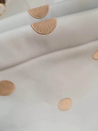 Bolso y sombrilla para cochecito a juego