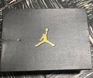 Jordan 1 Low Negro/Blanco/Naranja