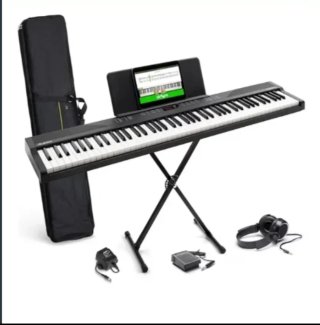 Teclado Musical Alesis con Accesorios