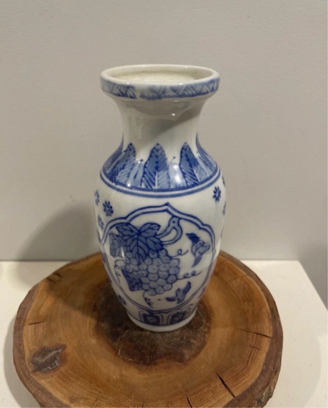 Jarrón vintage decorativo azul y blanco