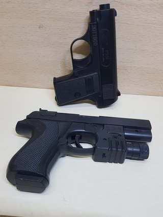 Pistolas de juguete negras