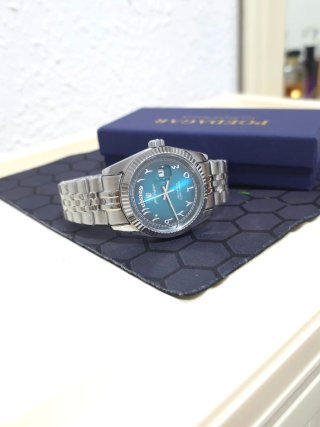 Reloj Poedagar Hombre Plata y Turquesa