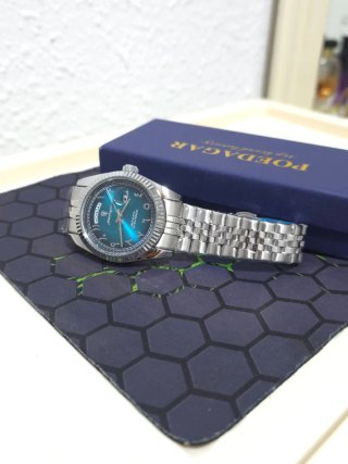 Reloj Poedagar Hombre Plata y Turquesa