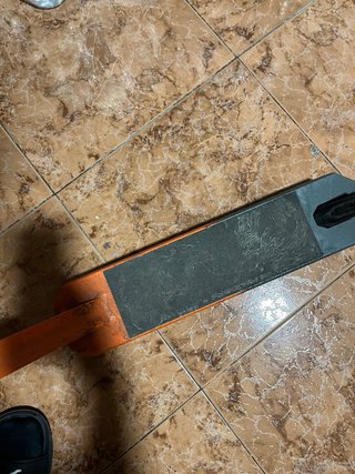 URGENTE Patín de freestyle naranja y negro