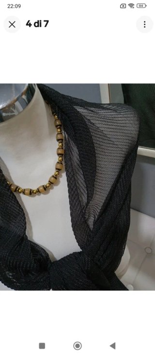 Stola coprispalle nero tessuto ondulato laminato