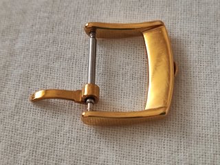 Fibbia Omega Oro