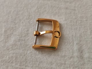 Fibbia Omega Oro