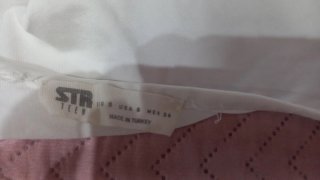 Suéter blanco escote redondo manga larga