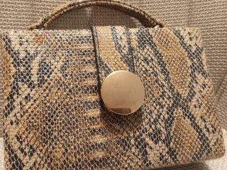 Bolso rígido efecto serpiente Tantrend