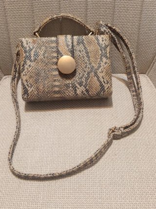 Bolso rígido efecto serpiente Tantrend