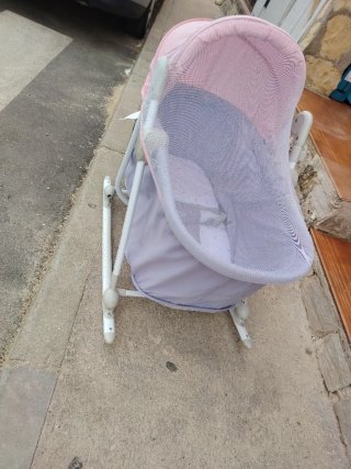Minicuna Kinderkraft con capota rosa