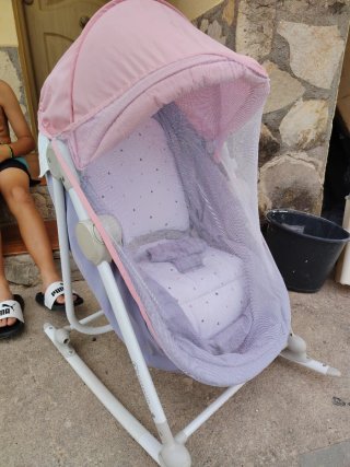 Minicuna Kinderkraft con capota rosa