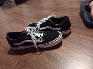 Zapatillas Vans Negras con Raya Blanca