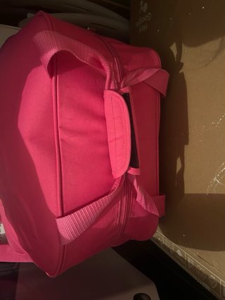 Mochila de mano rosa
