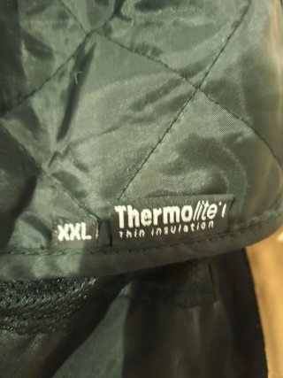 Chaqueta de moto dorada y negra