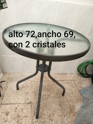 Mesa redonda cristal y metal 72x69 cm,con 2 crista