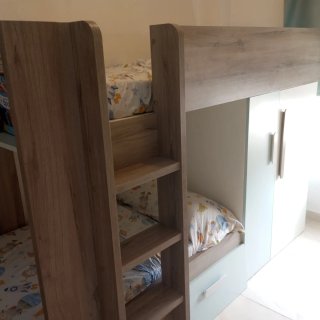 Cama tren Conforama litera con armario