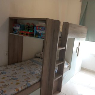 Cama tren Conforama litera con armario
